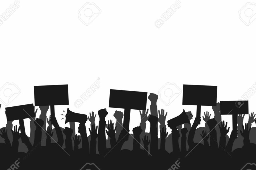 una fotografia en blanco y negro de una manifestacion con personas levantando pancartas