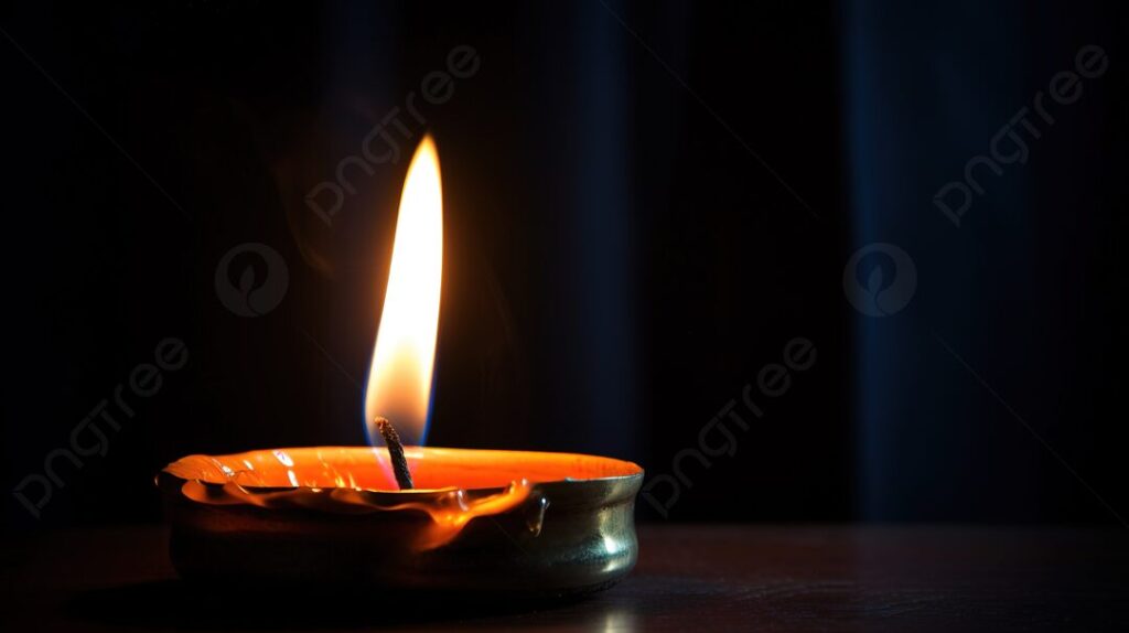 una imagen con una vela encendida en un fondo oscuro