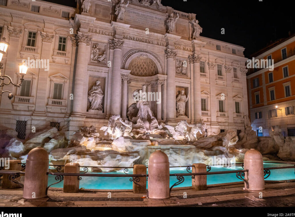 una imagen de la fontana di trevi en roma con una hermosa iluminacion nocturna