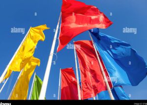 Oda a la patria: poemas cortos de Rubén Darío 2 una imagen de una bandera ondeando al viento con un fondo de colores vivos y llamativos