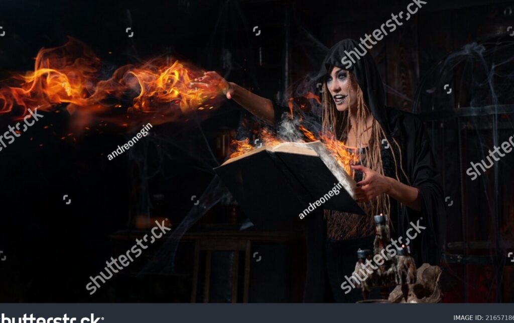 una mano sosteniendo un libro en llamas con un fondo oscuro y humo flotando en el aire
