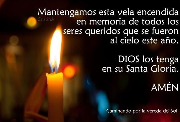 una vela encendida en memoria de seres queridos